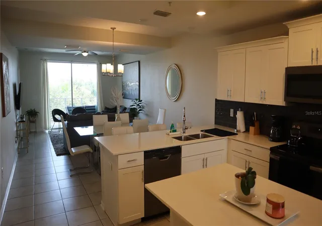 Photo 4 of Condo for sale at 4751 Clock Tower Dr #305, Kissimmee, FL 34746 | MLS# O6410323 | Listing updated on 2026-05-23