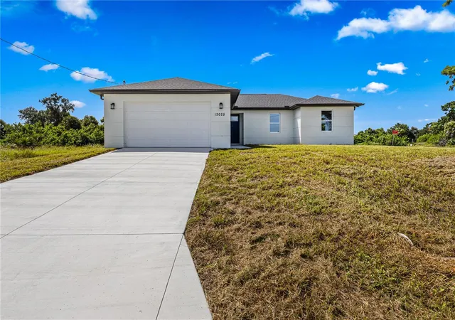 Photo 1 of Single family home for sale at 12025 Clarendon Ave, Port Charlotte, FL 33981 | MLS# TB8511833 | Listing updated on 2026-10-16