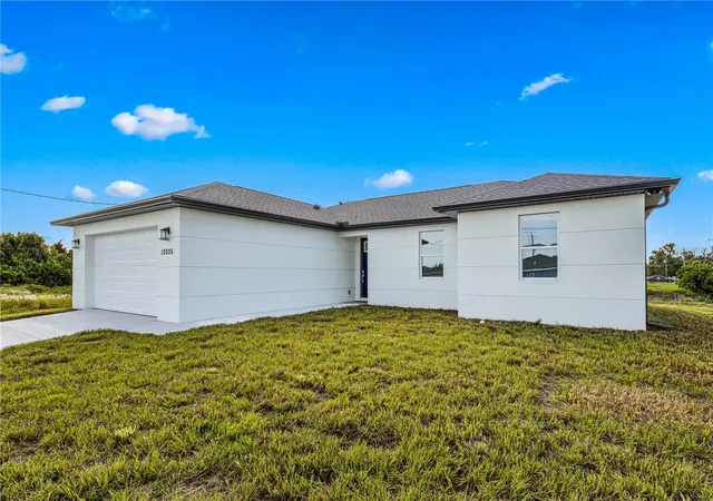 Photo 2 of Single family home for sale at 12025 Clarendon Ave, Port Charlotte, FL 33981 | MLS# TB8511833 | Listing updated on 2026-10-16