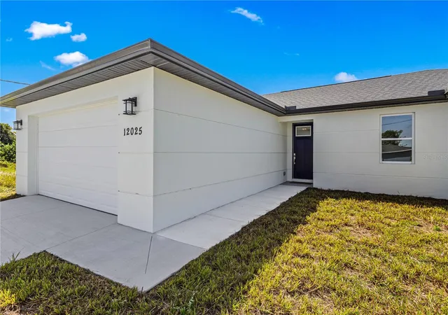 Photo 3 of Single family home for sale at 12025 Clarendon Ave, Port Charlotte, FL 33981 | MLS# TB8511833 | Listing updated on 2026-10-16