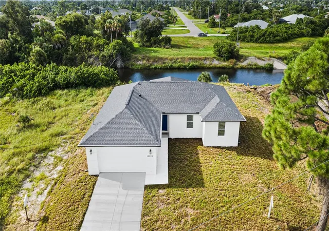 Photo 4 of Single family home for sale at 12025 Clarendon Ave, Port Charlotte, FL 33981 | MLS# TB8511833 | Listing updated on 2026-10-16