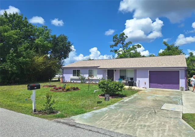 Photo 1 of Single family home for sale at 402 Cicero St Nw, Port Charlotte, FL 33948 | MLS# W7886050 | Listing updated on 2026-09-23