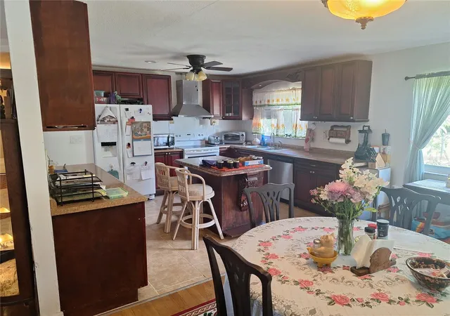 Photo 3 of Single family home for sale at 402 Cicero St Nw, Port Charlotte, FL 33948 | MLS# W7886050 | Listing updated on 2026-09-23