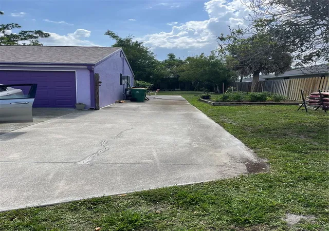 Photo 2 of Single family home for sale at 402 Cicero St Nw, Port Charlotte, FL 33948 | MLS# W7886050 | Listing updated on 2026-09-23
