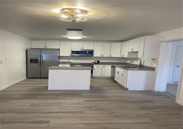 Photo 4 of Single family home for sale at 603 Maggie Cir, Winter Haven, FL 33880 | MLS# O6410507 | Listing updated on 2026-10-09