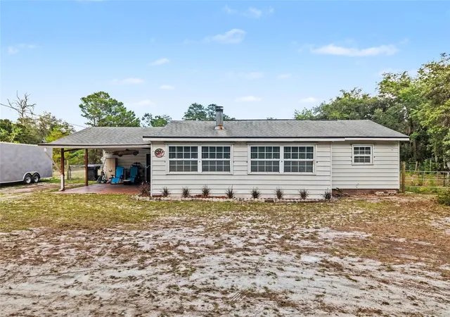 1st image of 44216 Lake Mack Dr, Deland, FL 32720 | MLS# O6410551