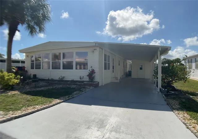Photo 2 of Manufactured home for sale at 2100 Kings Hwy #98, Port Charlotte, FL 33980 | MLS# C7526535 | Listing updated on 2026-10-07