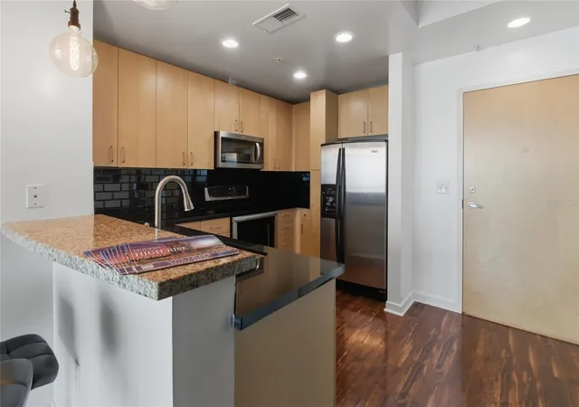 Photo 3 of Condo for sale at 155 S Court Ave #1113, Orlando, FL 32801 | MLS# O6410665 | Listing updated on 2026-07-24