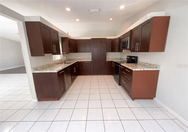 Photo 2 of Single family home for sale at 1750 Evergreen Ct, Kissimmee, FL 34746 | MLS# O6410743 | Listing updated on 2026-09-18