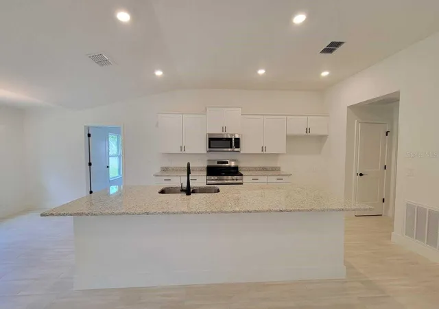 Photo 3 of Single family home for sale at 14590 Sw 69th Court Rd, Ocala, FL 34473 | MLS# OM725364 | Listing updated on 2026-10-08