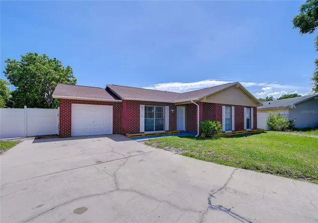 Photo 2 of Single family home for sale at 7214 Nia Ln, Tampa, FL 33625 | MLS# TB8512218 | Listing updated on 2026-09-26
