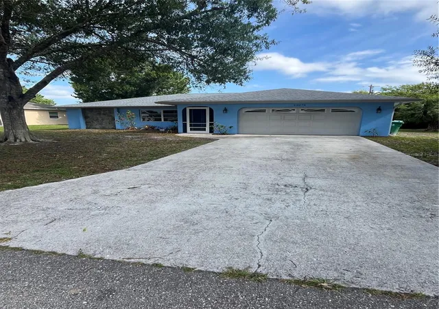 Photo 1 of Single family home for sale at 23076 August Ave, Port Charlotte, FL 33954 | MLS# P4938809 | Listing updated on 2026-06-22