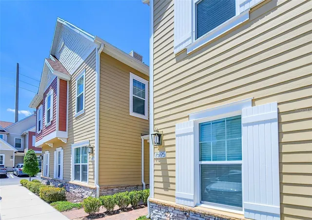 Photo 2 of Townhouse for sale at 7595 Sunny Dreams Ln, Kissimmee, FL 34747 | MLS# O6410894 | Listing updated on 2026-05-27