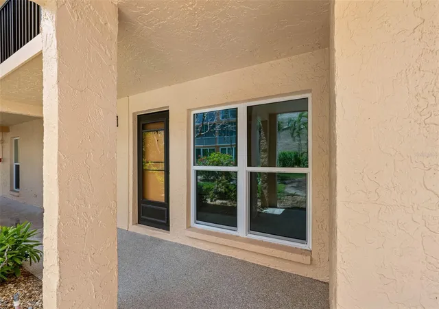 Listing Photo 4 - Condo for sale in building located at 8921 Blind Pass Rd, ST PETE BEACH, FL 33706 - Unit #141