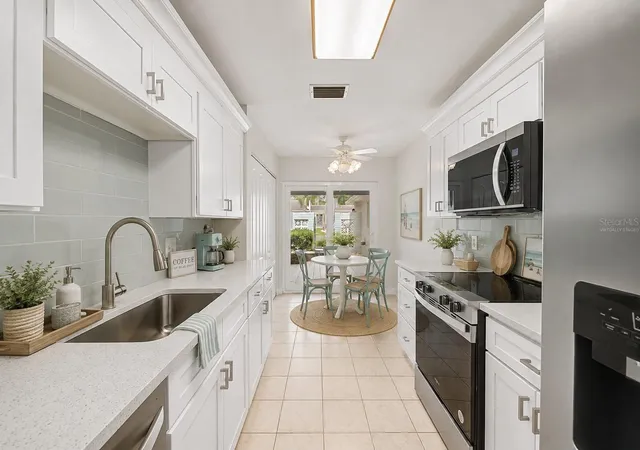 Listing Photo 4 - Condo for sale in building located at 144 Boca Ciega Pt Blvd N, Saint Petersburg, FL 33708