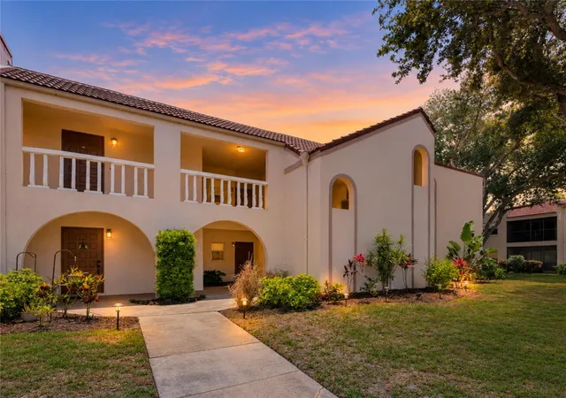 Listing Photo 1 - Condo for sale in building located at 9700 Starkey Rd, Largo, FL 33777 - Unit #228