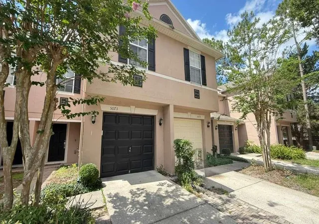 Photo 1 of Townhouse for sale at 5073 Kingscrest Ln, Oviedo, FL 32765 | MLS# O6411016 | Listing updated on 2026-10-05