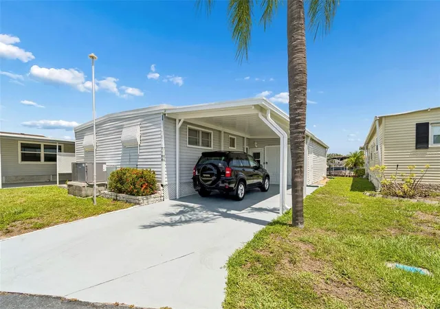 Photo 1 of Manufactured home for sale at 7186 Mount Arlington Dr Ne #421, Saint Petersburg, FL 33702 | MLS# TB8512421 | Listing updated on 2026-09-12