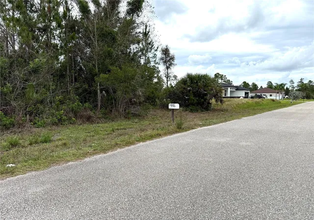 Photo 1 of Land for sale at 1009 Jackson Ave, Lehigh Acres, FL 33972 | MLS# OM725425 | Listing updated on 2026-06-02