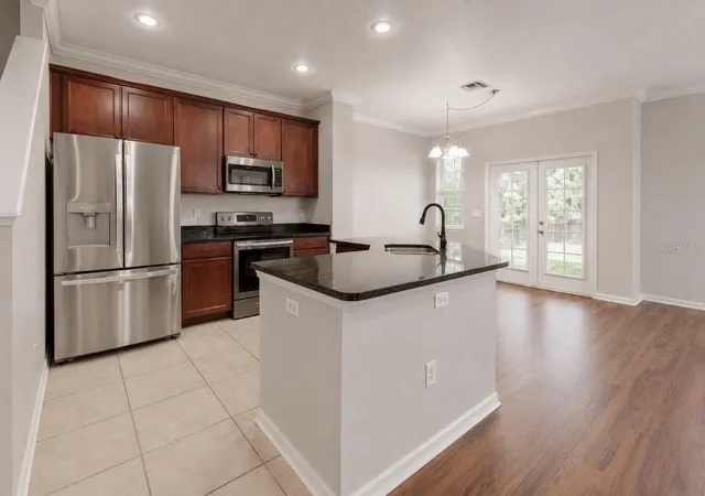 Photo 3 of Townhouse for sale at 7539 Tamarind Ave, Tampa, FL 33625 | MLS# TB8512465 | Listing updated on 2026-09-26