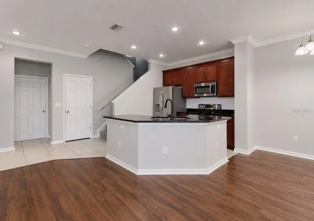 Photo 3 of Townhouse for sale at 7539 Tamarind Ave, Tampa, FL 33625 | MLS# TB8512465 | Listing updated on 2026-09-26