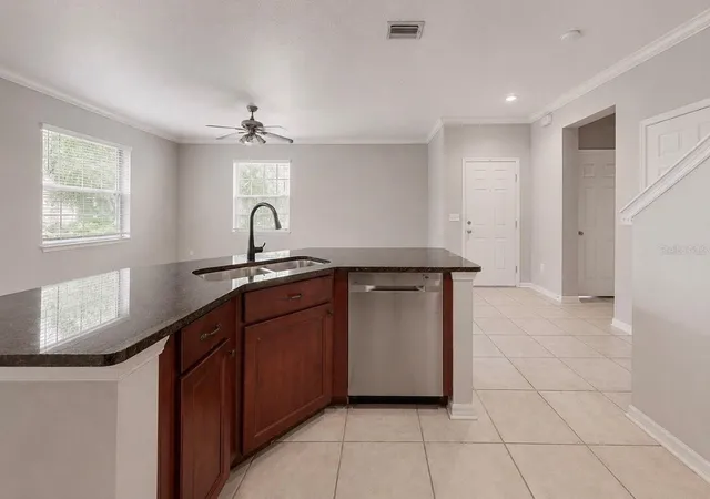Photo 4 of Townhouse for sale at 7539 Tamarind Ave, Tampa, FL 33625 | MLS# TB8512465 | Listing updated on 2026-09-26