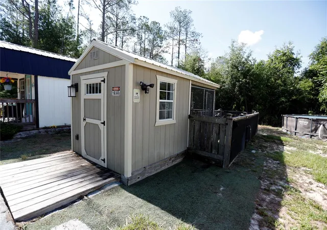 4th image of 9060 Kindlewood Trl, Brooksville, FL 34613 | MLS# W7886125
