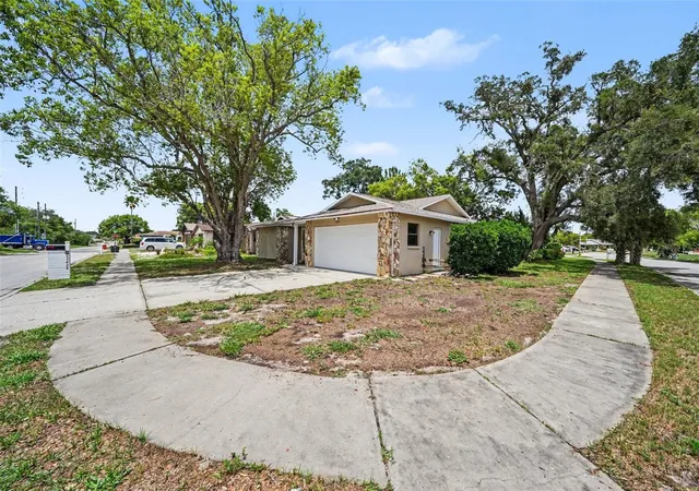 Photo 3 of Single family home for sale at 11424 Scallop Dr, Port Richey, FL 34668 | MLS# O6411124 | Listing updated on 2026-07-31