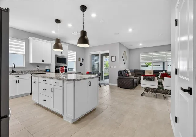 Photo 3 of Single family home for sale at 7239 Ivy Tendril Ave, Orlando, FL 32829 | MLS# O6411160 | Listing updated on 2026-09-05