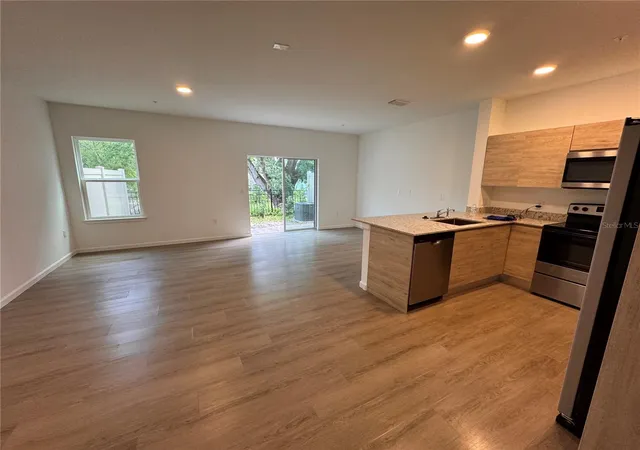 Photo 3 of Townhouse for sale at 1209 Southstation Pl #306, Orlando, FL 32809 | MLS# O6411174 | Listing updated on 2026-08-04
