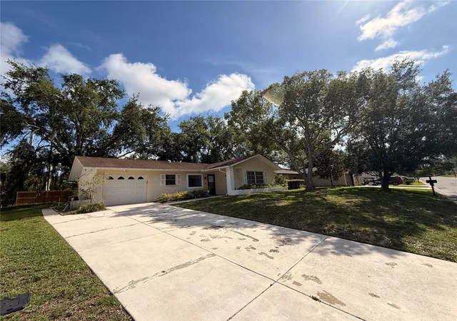 2nd image of 8634 Winding Wood Dr, Port Richey, FL 34668 | MLS# W7886138