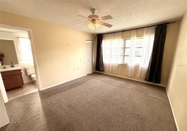 5th image of 8634 Winding Wood Dr, Port Richey, FL 34668 | MLS# W7886138