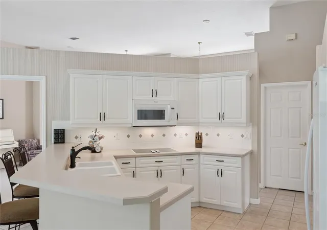 Photo 3 of Single family home for sale at 3823 Winding Lake Cir, Orlando, FL 32835 | MLS# O6411193 | Listing updated on 2026-09-05