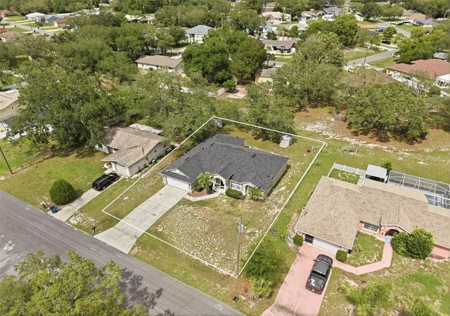 Photo 2 of Single family home for sale at 10487 Bradford St, Spring Hill, FL 34608 | MLS# W7886141 | Listing updated on 2026-09-01