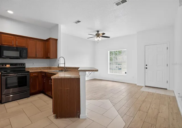 4th image of 1923 Yellowfin Dr, Port Orange, FL 32128 | MLS# TB8512782
