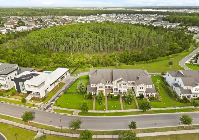 Photo 2 of Townhouse for sale at 14229 Kellogg Ave, Orlando, FL 32827 | MLS# O6411419 | Listing updated on 2026-09-12