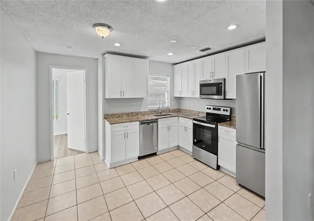 4th image of 7419 Ivory Ter, New Port Richey, FL 34655 | MLS# TB8512984