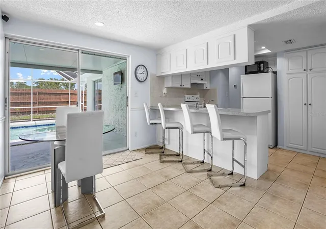 Photo 4 of Single family home for sale at 8747 Hemlock Ln, Port Richey, FL 34668 | MLS# TB8513054 | Listing updated on 2026-08-10