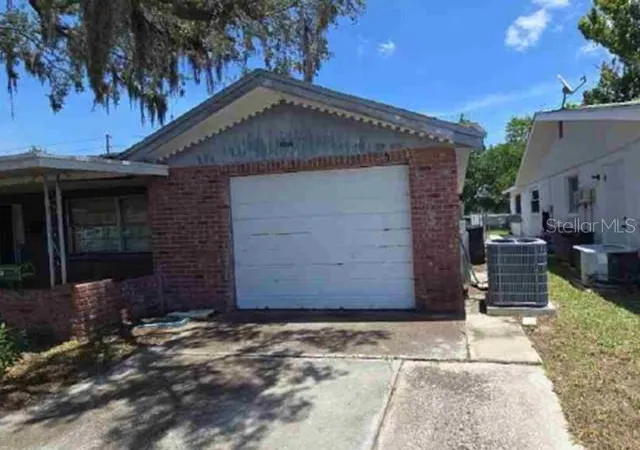 Photo 2 of Single family home for sale at 10914 Queens Rd, Port Richey, FL 34668 | MLS# O6411534 | Listing updated on 2026-09-18