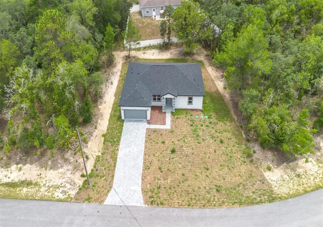 Photo 3 of Single family home for sale at 1318 W Dupont Dr, Dunnellon, FL 34434 | MLS# O6411568 | Listing updated on 2026-10-09