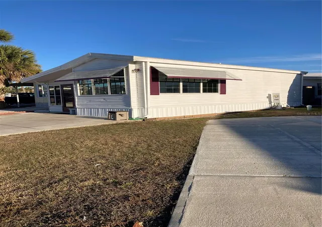 Photo 3 of Manufactured home for sale at 9000 US Hwy 192 #729, Clermont, FL 34714 | MLS# TB8513158 | Listing updated on 2026-09-16