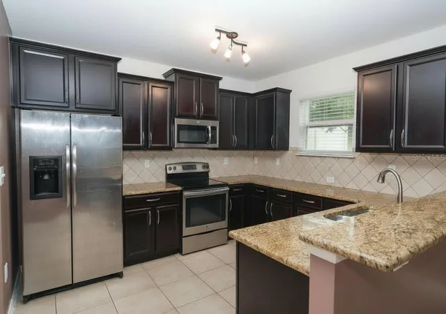 Photo 2 of Single family home for sale at 5909 Windsong Oak Dr, Leesburg, FL 34748 | MLS# O6411614 | Listing updated on 2026-10-07