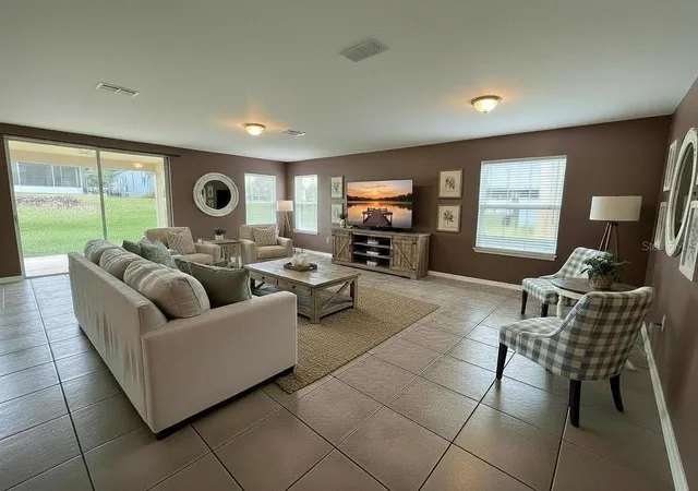 Photo 3 of Single family home for sale at 5909 Windsong Oak Dr, Leesburg, FL 34748 | MLS# O6411614 | Listing updated on 2026-10-07