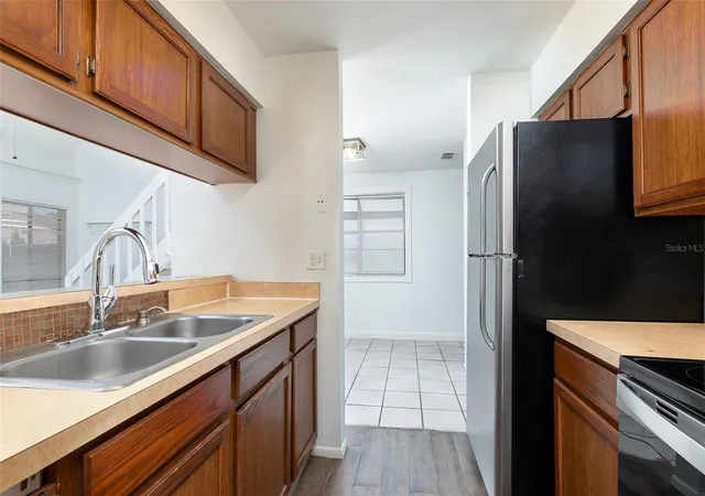 Photo 3 of Townhouse for sale at 2745 Tally Ho Ave, Orlando, FL 32826 | MLS# O6411652 | Listing updated on 2026-08-31