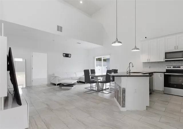 Photo 3 of Single family home for sale at 3702 Wiggins Leaf St, Tampa, FL 33619 | MLS# TB8513246 | Listing updated on 2026-08-17