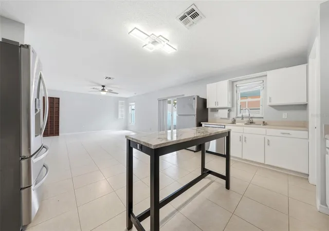 Photo 4 of Single family home for sale at 10048 Ian St, Orlando, FL 32825 | MLS# O6411783 | Listing updated on 2026-09-02