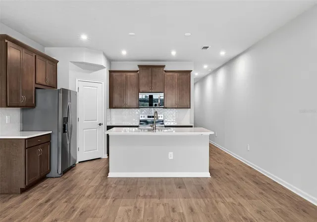 Photo 4 of Townhouse for sale at 9187 Aurelia Ave, Parrish, FL 34219 | MLS# TB8513770 | Listing updated on 2026-10-28
