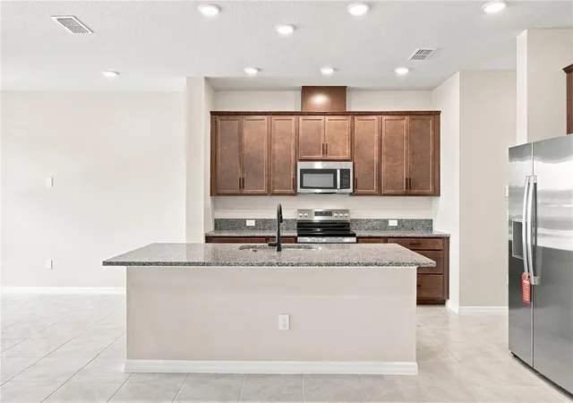 Photo 3 of Townhouse for sale at 5588 Coopers Hawk Ct, St Cloud, FL 34772 | MLS# TB8513773 | Listing updated on 2026-09-15