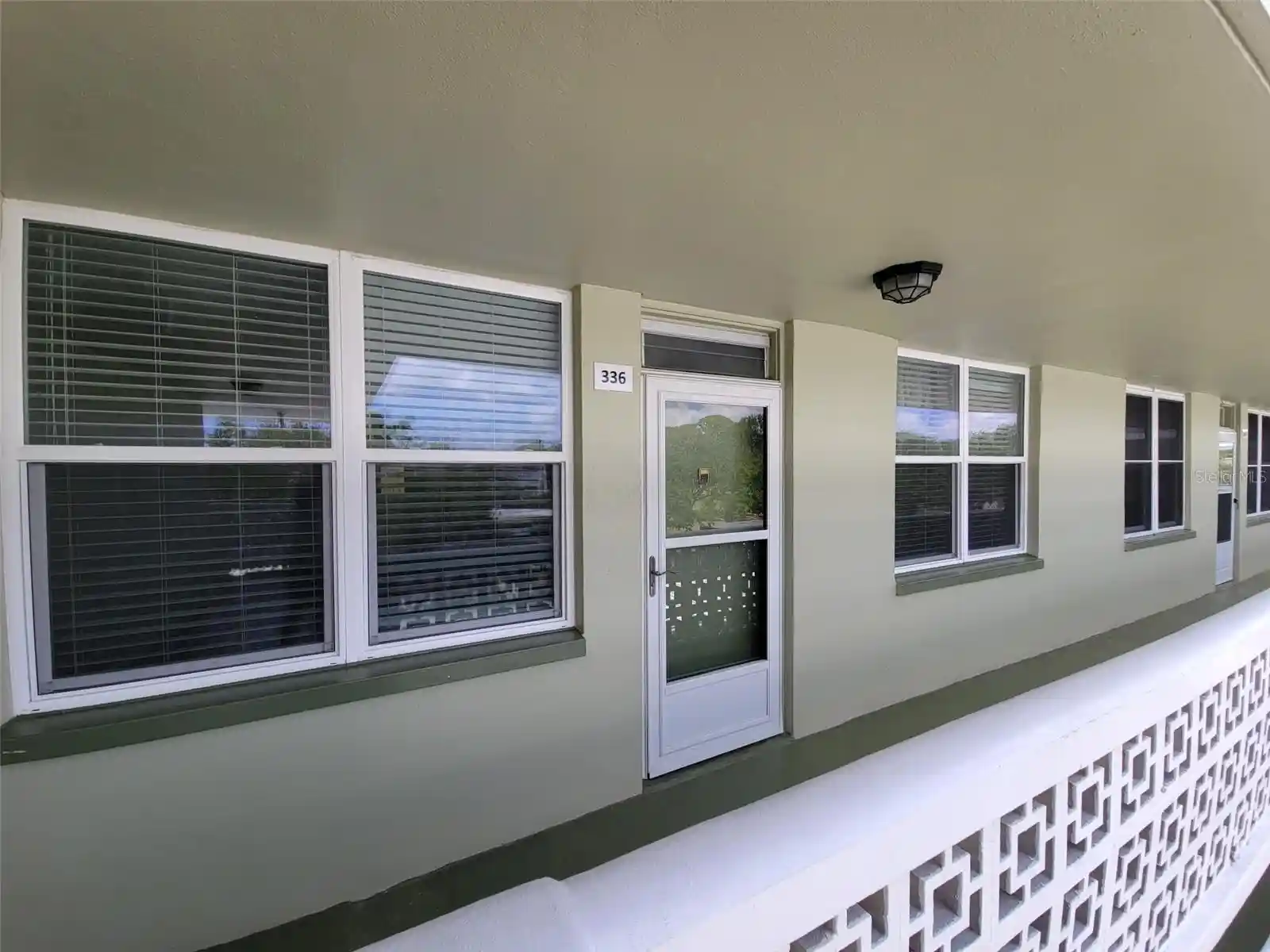 Listing Photo 1 - Condo for sale in 4890 Bay St Ne located at 4890 Bay St Ne, St. Petersburg, FL 33703 - Unit #336