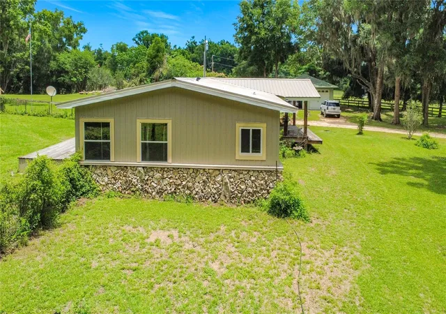 Photo 3 of Manufactured home for sale at 1919 Nw 100th Street, Ocala, FL 34475 | MLS# OM725689 | Listing updated on 2026-09-22